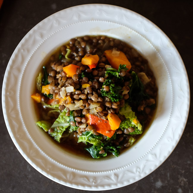 lentil soup with rosemary, squash and leafy greens